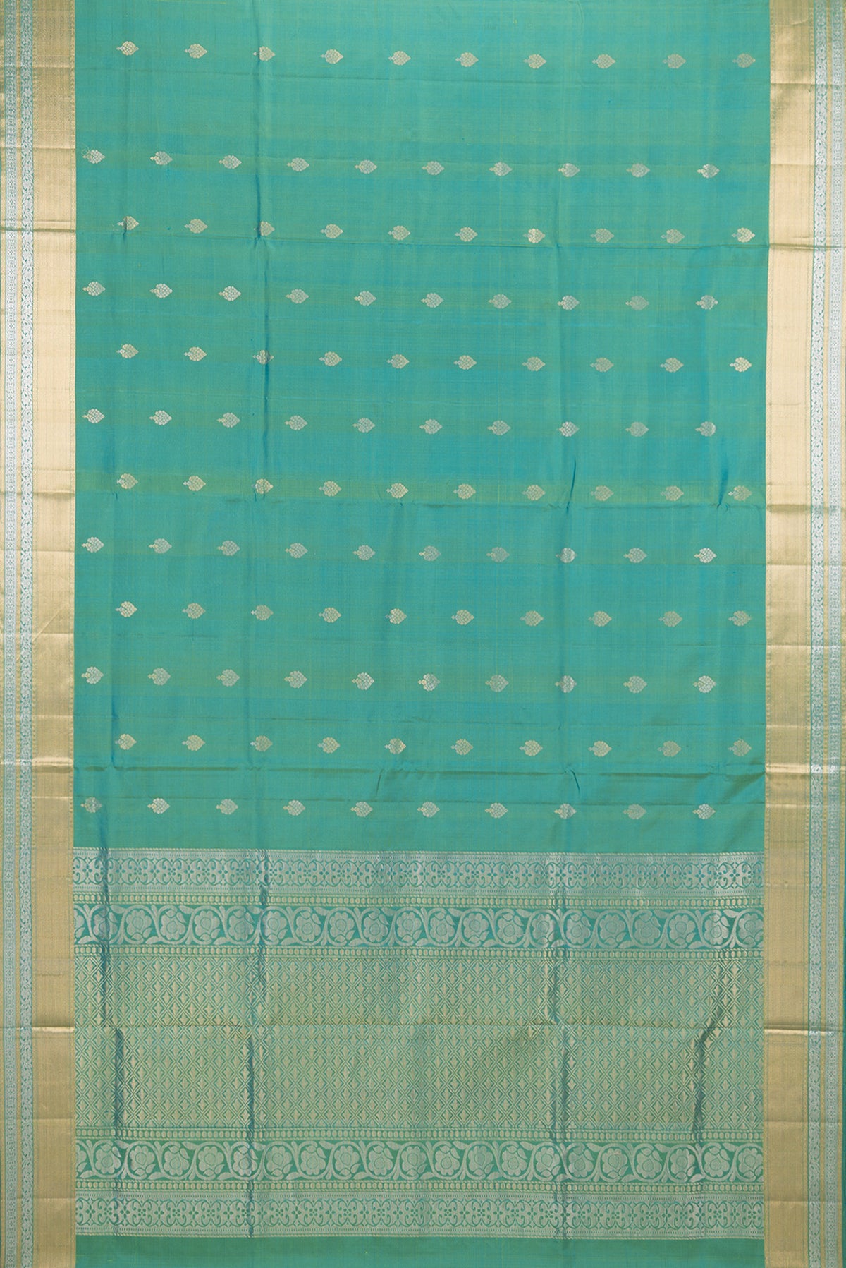 Flat view of Pure Silk Turquoise Dual Tone Soft Saree with Zari Butta on the body and Zari Border. 