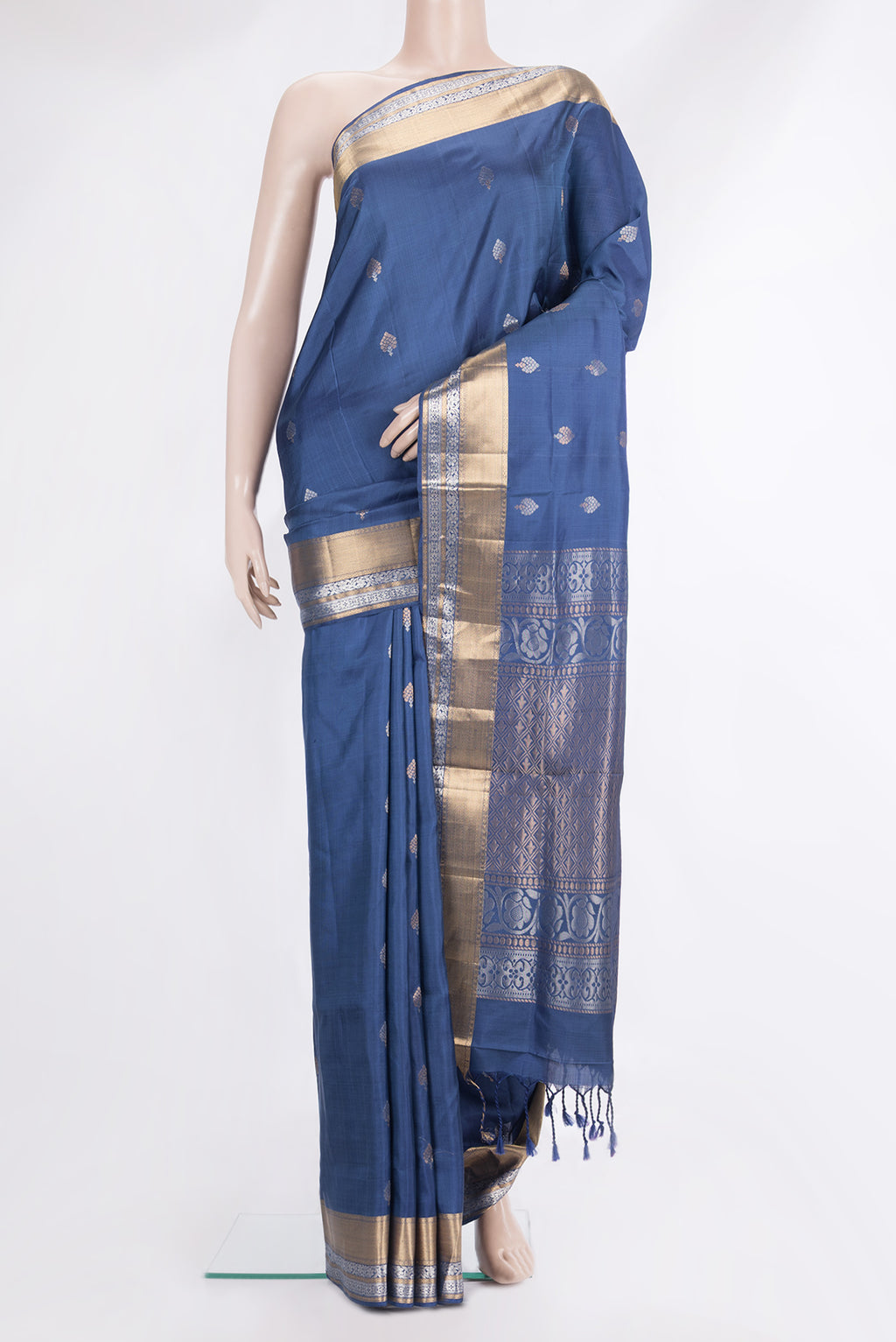 Pure Silk Blue Soft Saree with Zari Butta on the body and Zari Border.  displayed on a mannequin