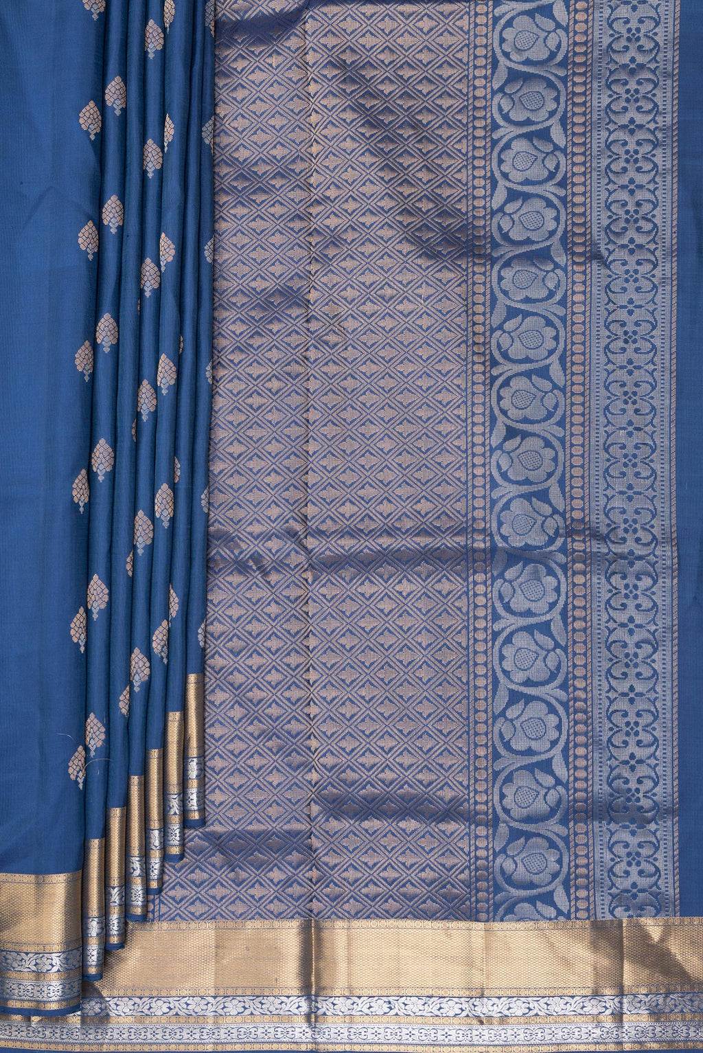 Pleats and pallu of Pure Silk Blue Soft Saree with Zari Butta on the body and Zari Border. 