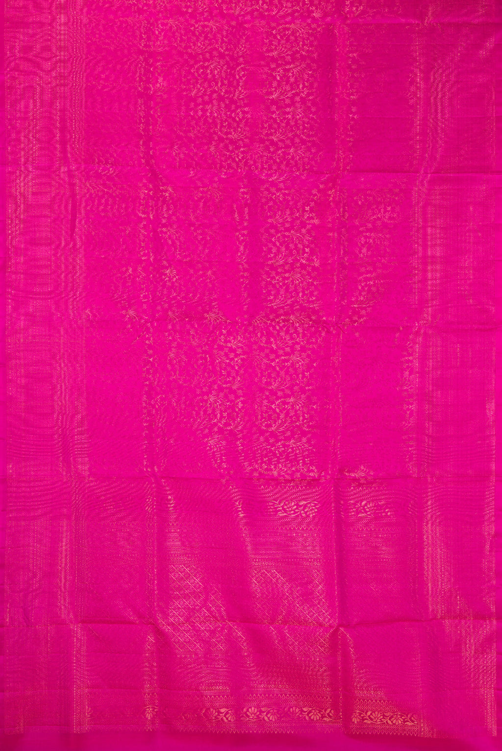 Flat view of Pure Silk Rani Pink Soft Saree with Zari Brocade on the body and Fancy Border. 
