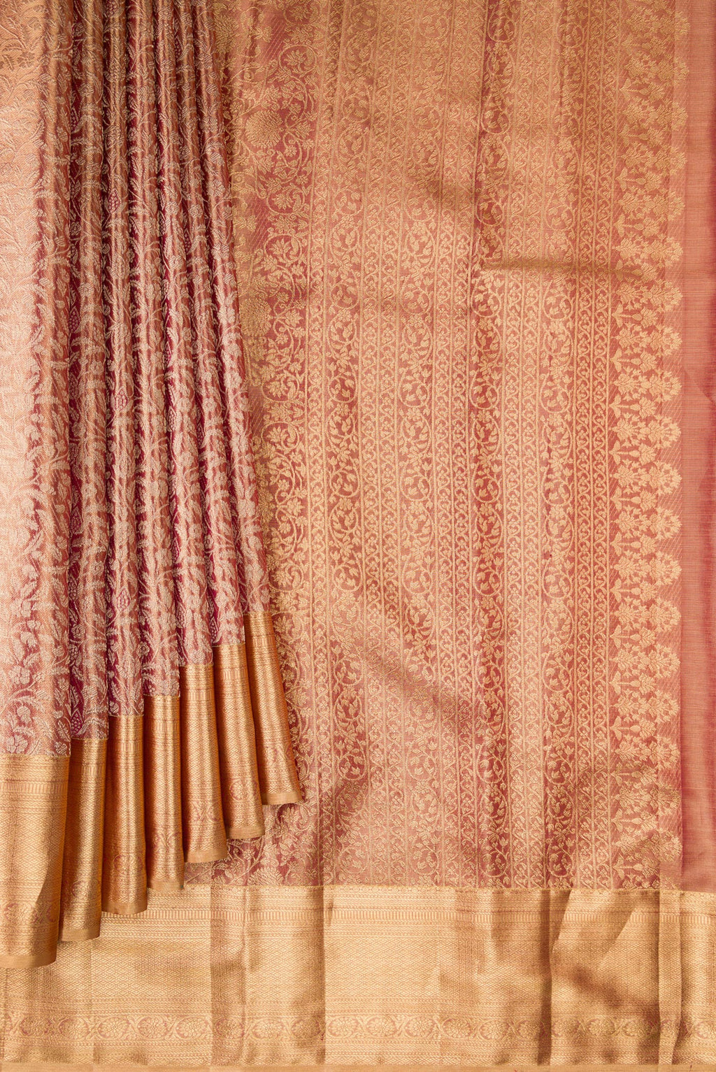 Pleats and pallu of Gold with Red Color Kanjivaram Tissue Saree with Zari Brocade on the body and Zari Border. 