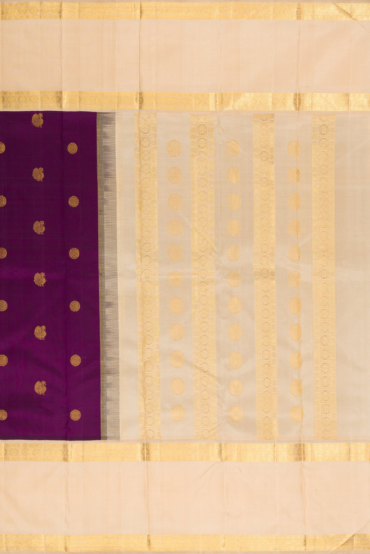 Close up image of the pallu of Pure Silk Purple Kanchipuram Saree with Zari Butta on the body and Zari Border. 
