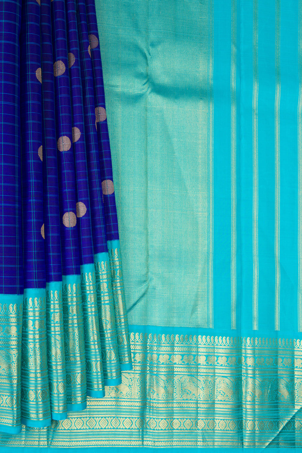 Pleats and pallu of Pure Silk Royal Blue Kanchipuram Saree with Checked design on the body and Zari Border. 