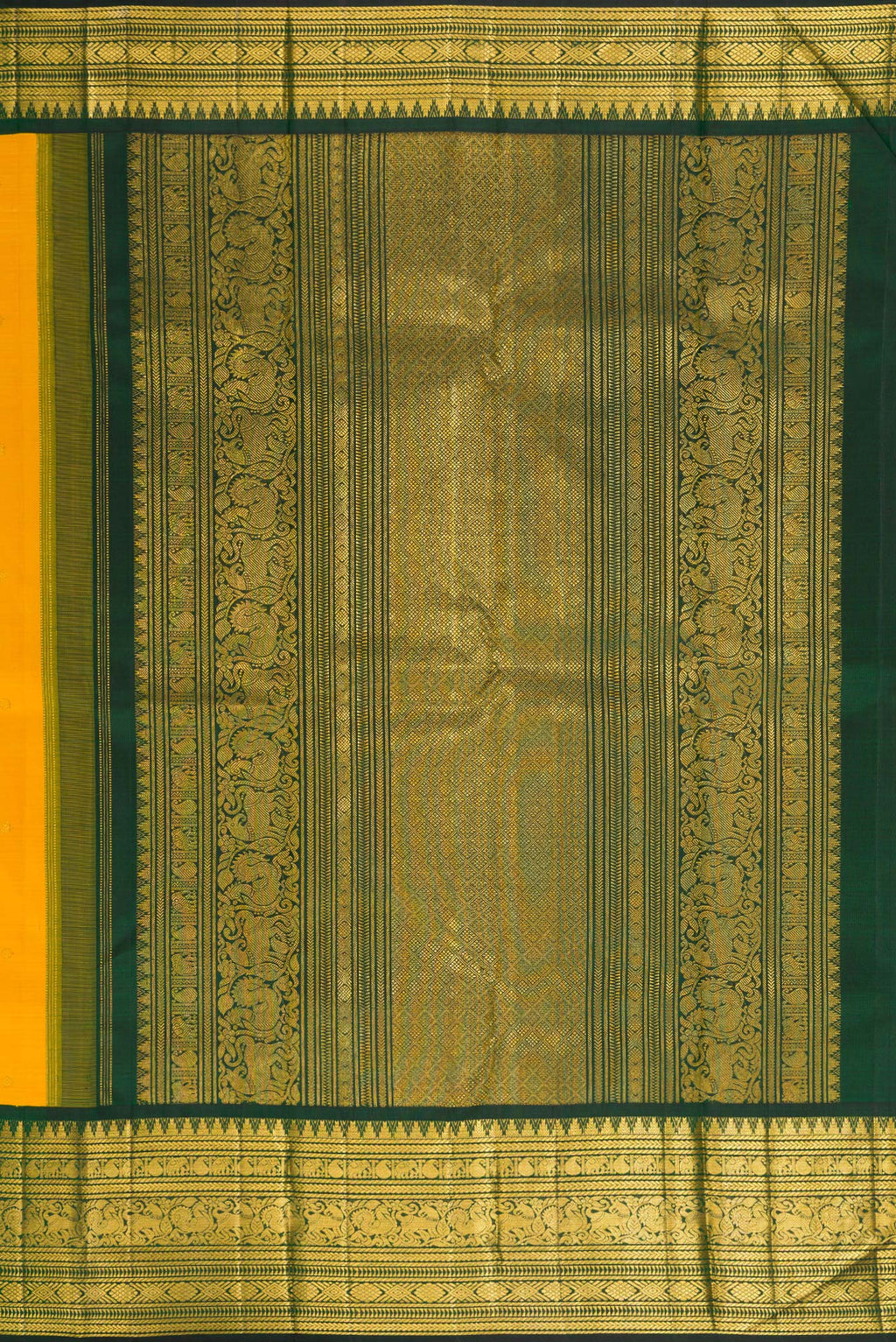 Close up image of the pallu of Pure Silk Mustard Kanchipuram Saree with Zari Butta on the body and Fancy Border. 