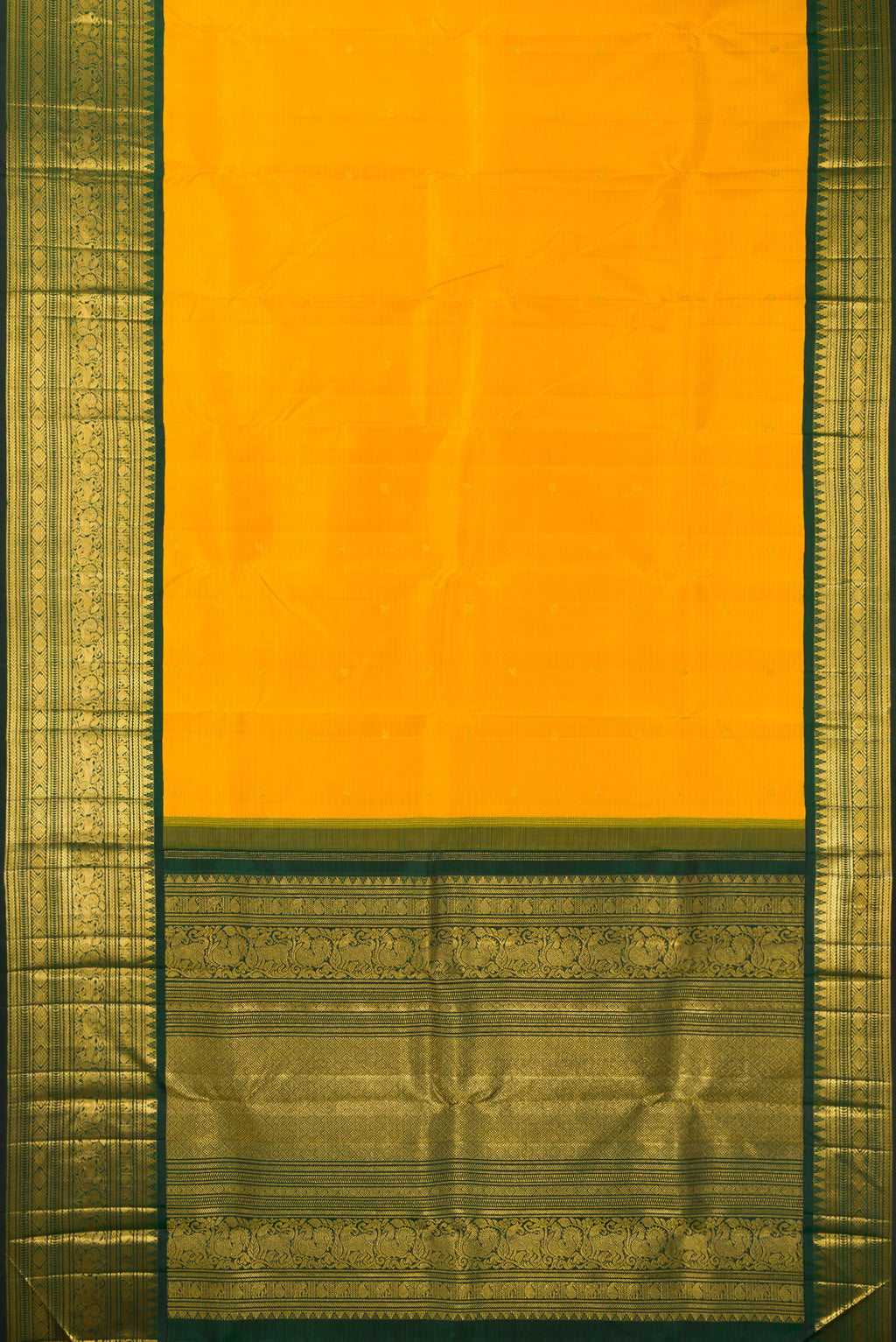 Flat view of Pure Silk Mustard Kanchipuram Saree with Zari Butta on the body and Fancy Border. 