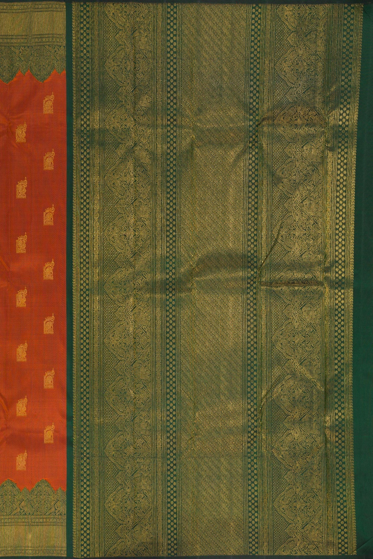 Close up image of the pallu of Pure Silk Rust Kanchipuram Saree with Zari Butta on the body and Fancy Border. 