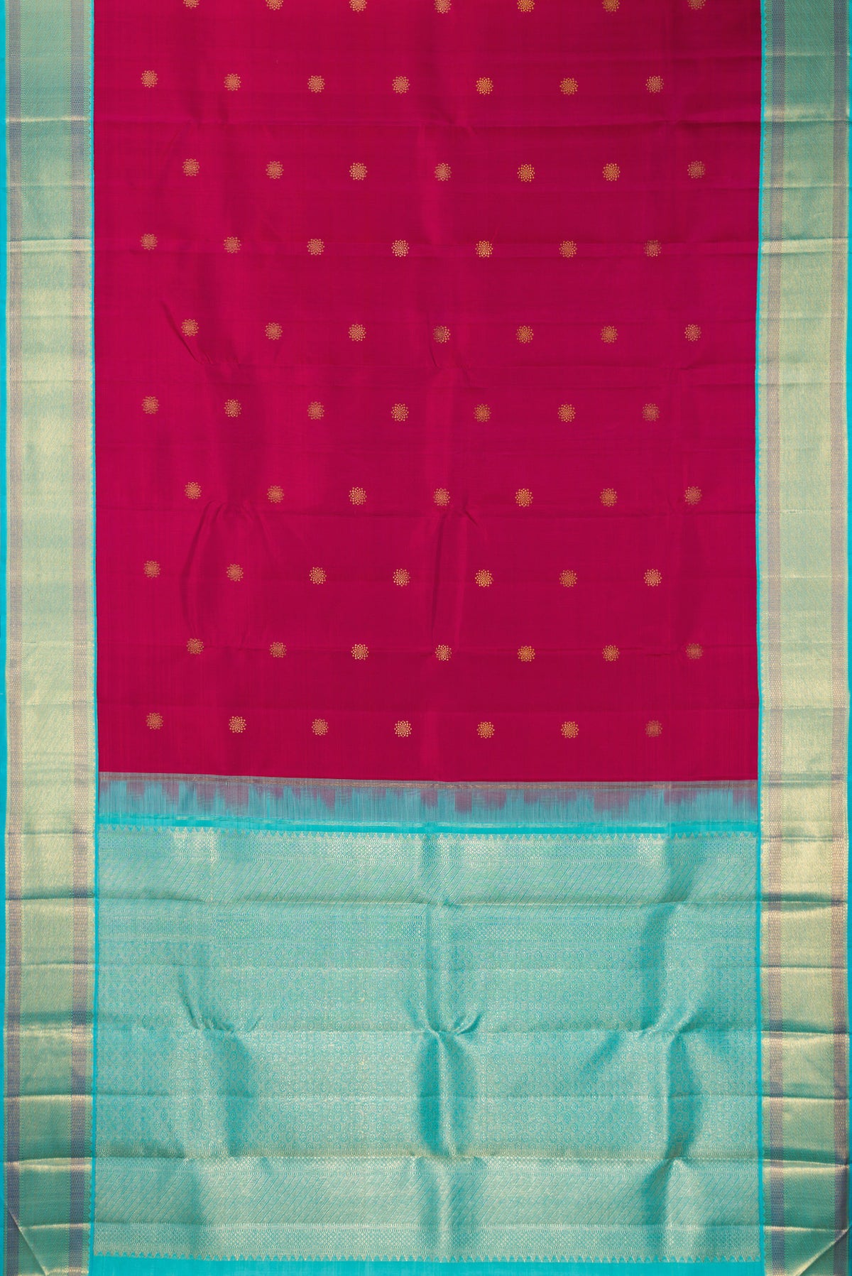 Flat view of Pure Silk Dark Pink Kanchipuram Saree with Zari Butta on the body and Zari Border. 