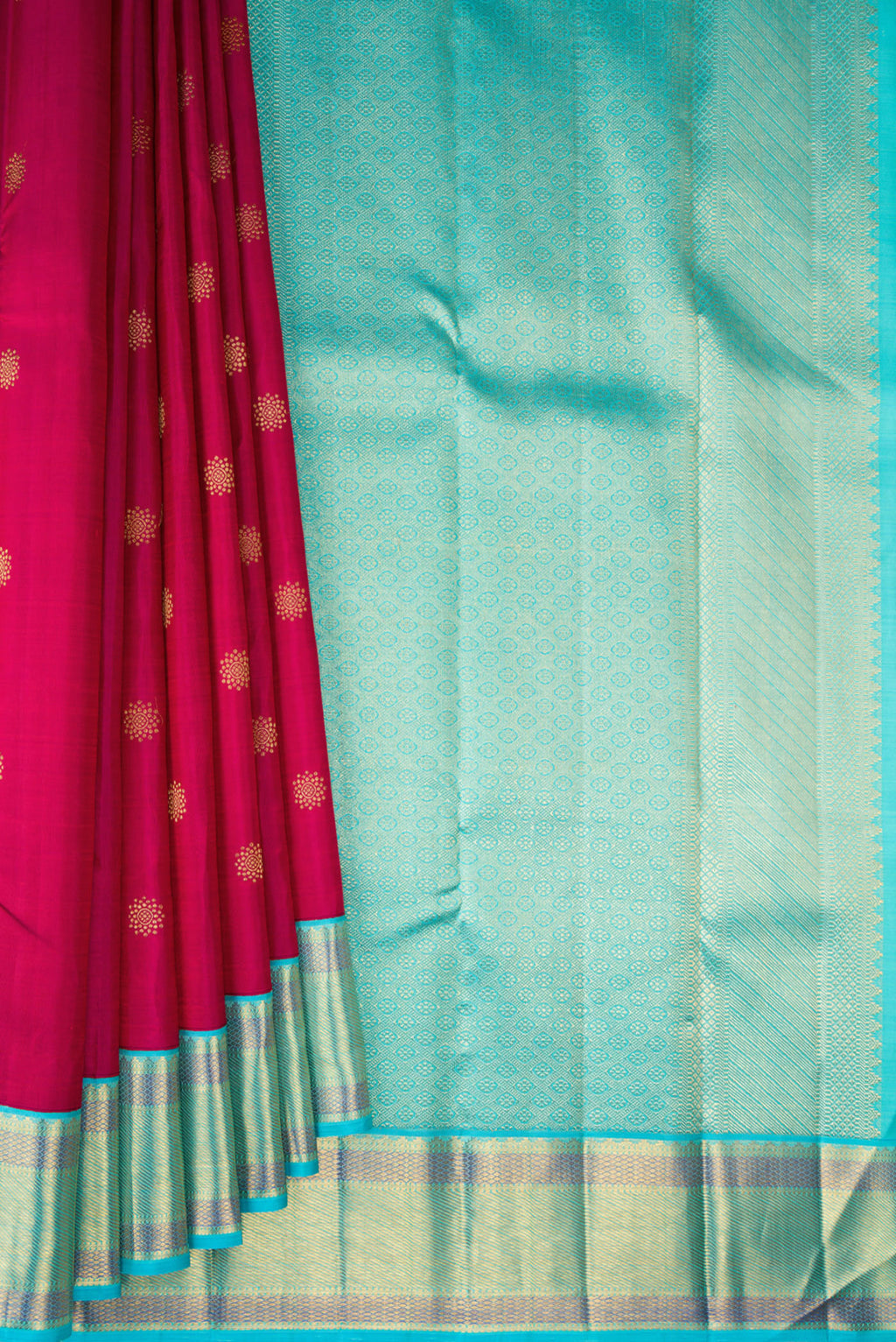 Pleats and pallu of Pure Silk Dark Pink Kanchipuram Saree with Zari Butta on the body and Zari Border. 
