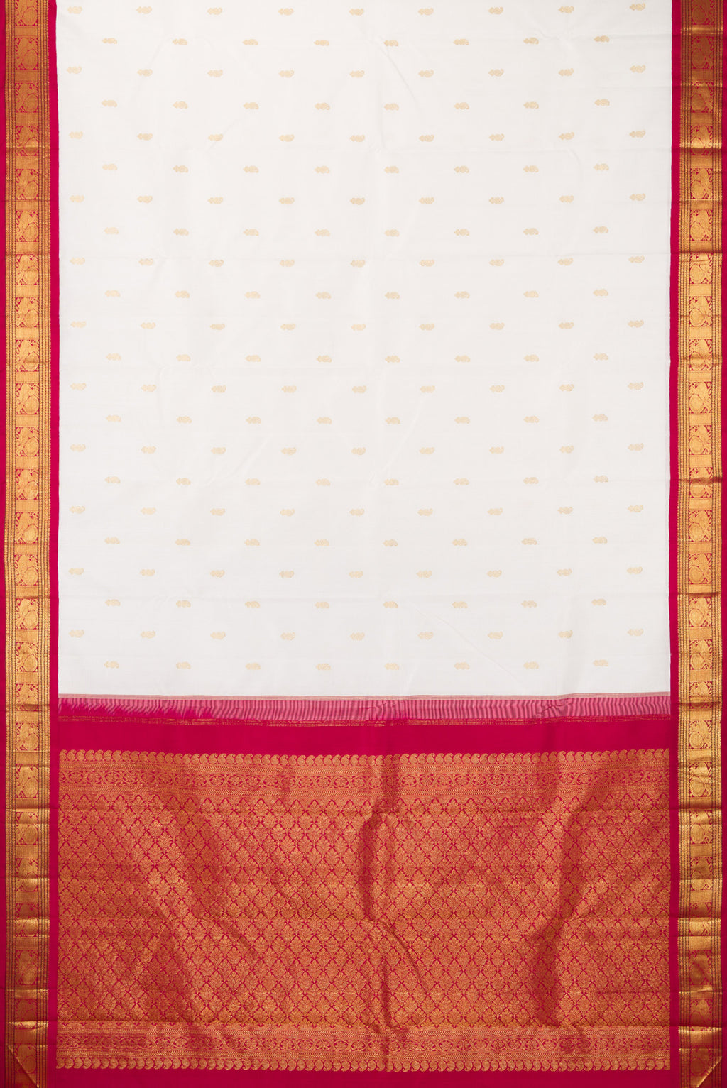 Flat view of Pure Silk White Kanjivaram Saree with Zari Butta on the body and Zari Border. 