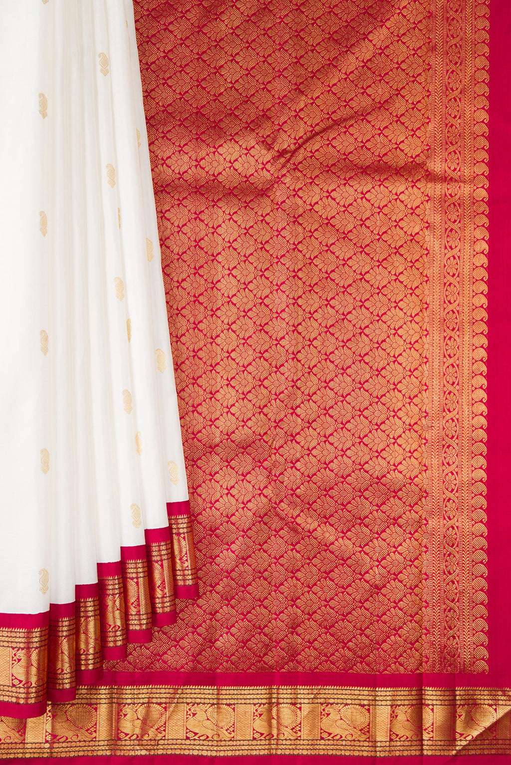Pleats and pallu of Pure Silk White Kanjivaram Saree with Zari Butta on the body and Zari Border. 