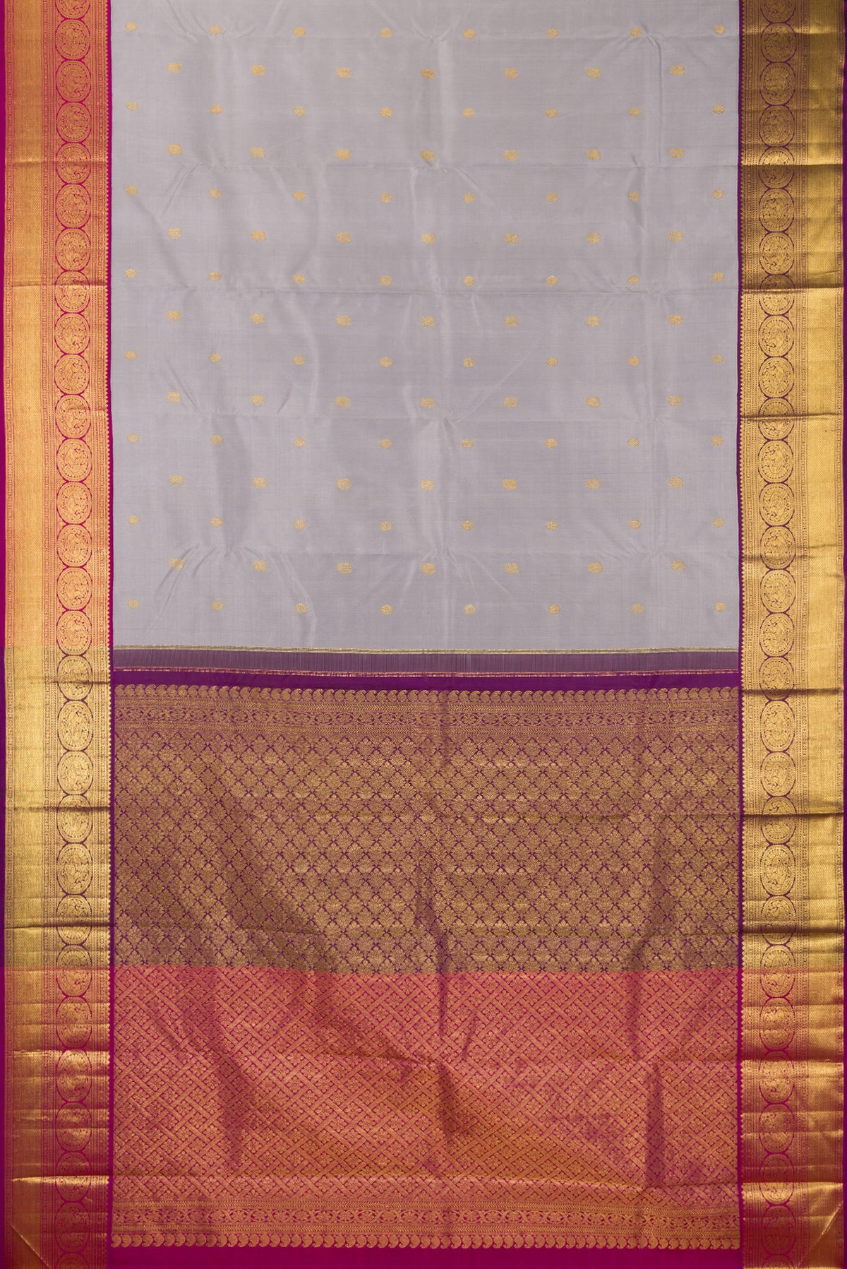 Flat view of Pure Silk Grey Kanchipuram Saree with Zari Butta on the body and Zari Border. 