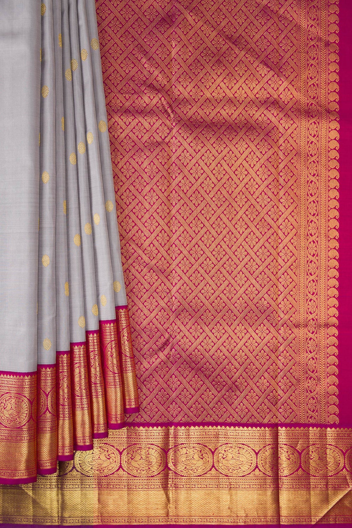 Pleats and pallu of Pure Silk Grey Kanchipuram Saree with Zari Butta on the body and Zari Border. 