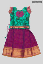 Flat lay front image of Green Readymade Cotton Pavadai Set with Zari Butta on the body and Zari Border