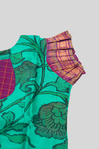 Close up sleeve details of Green Readymade Cotton Pavadai Set with Zari Butta on the body and Zari Border