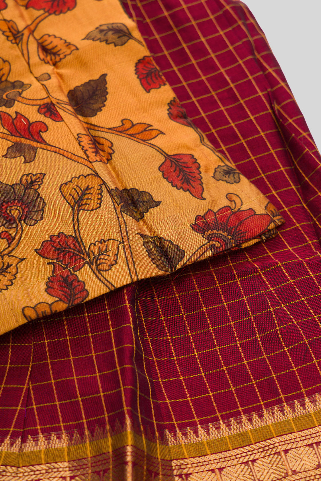 Detailed shot of Mustard Readymade Cotton Pavadai Set with Zari Butta on the body and Zari Border