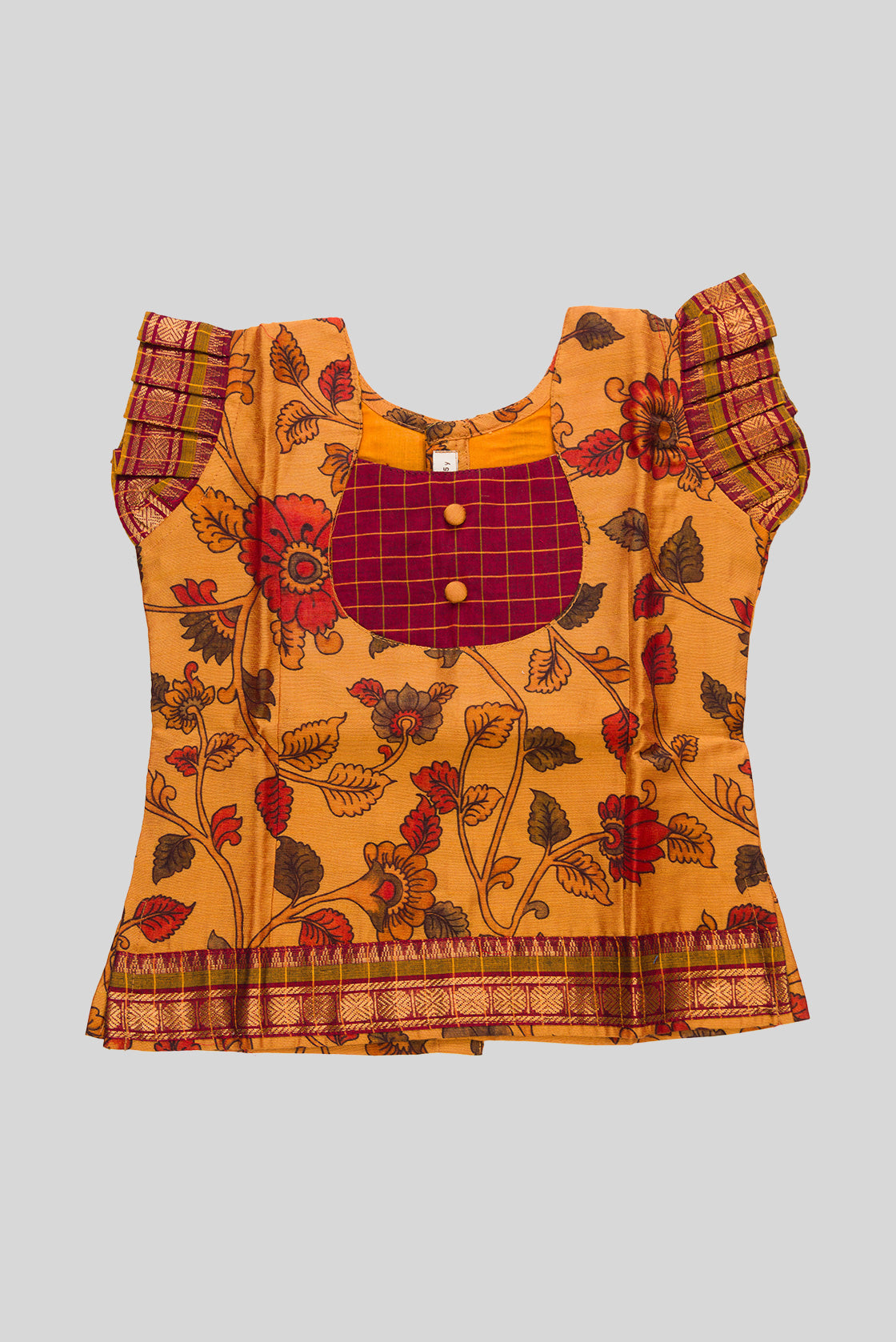 Close up blouse image of Mustard Readymade Cotton Pavadai Set with Zari Butta on the body and Zari Border