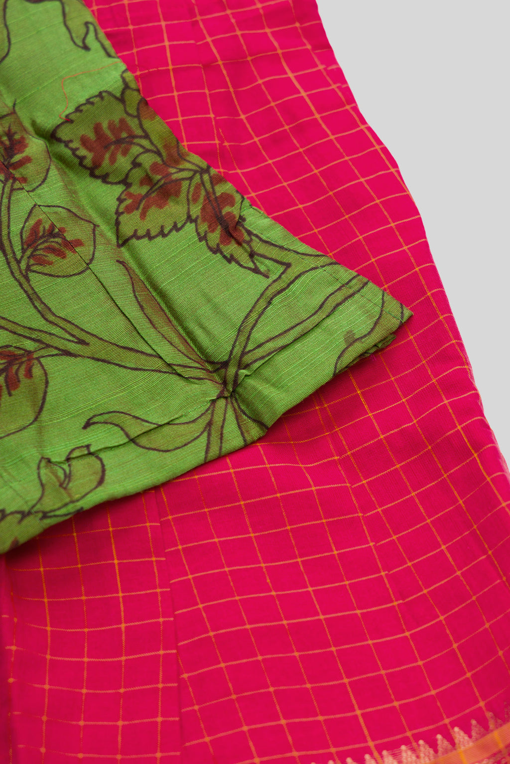 Detailed shot of Green Readymade Cotton Pavadai Set with Zari Butta on the body and Zari Border