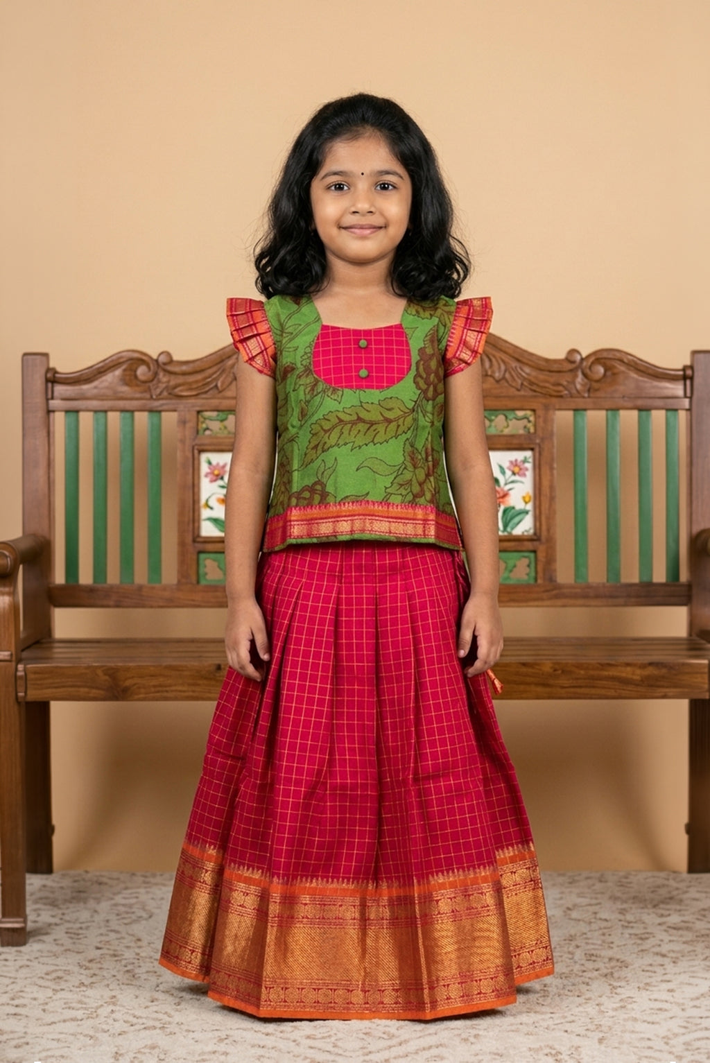Green Readymade Cotton Pavadai Set with Zari Butta on the body and Zari Border displayed on a mannequin