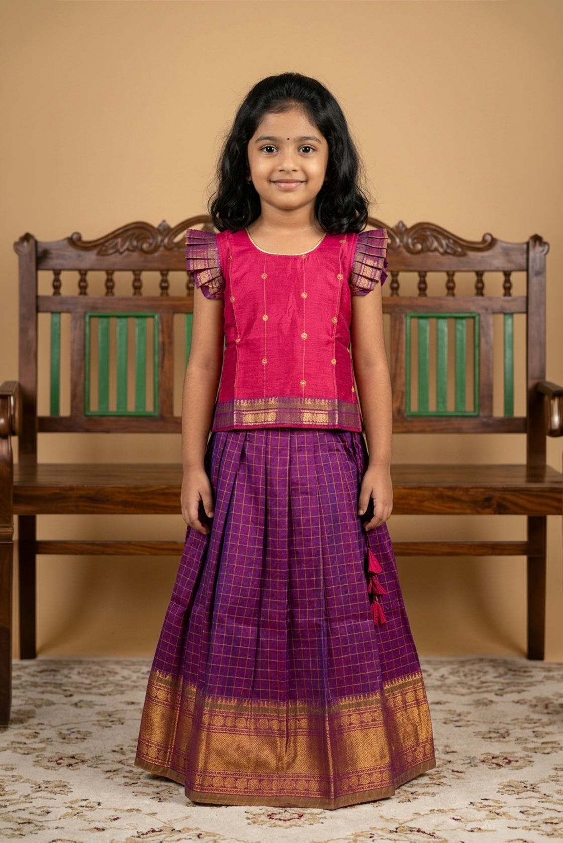 Coral Readymade Cotton Pavadai Set with Zari Butta on the body and Zari Border displayed on a mannequin