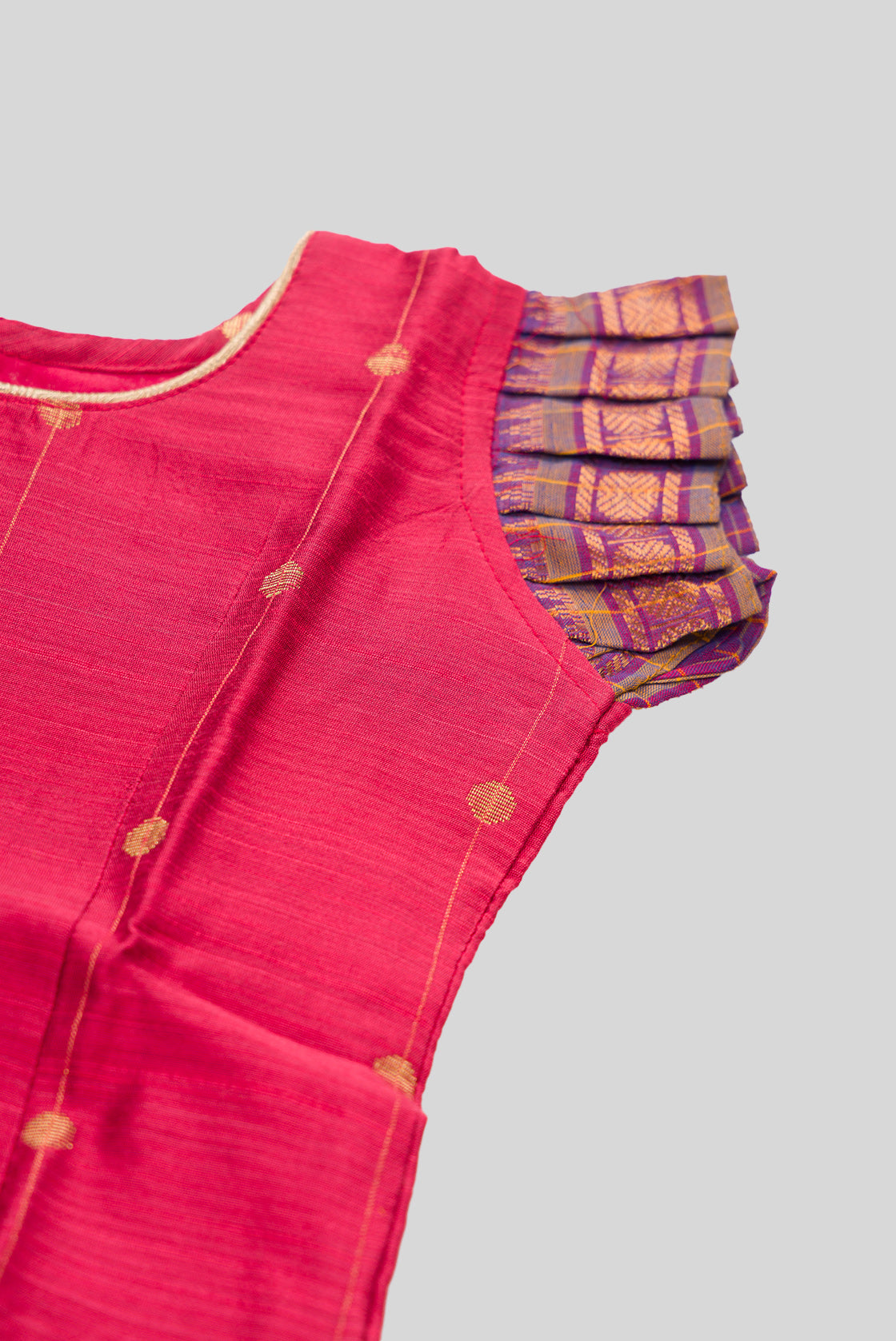 Close up sleeve details of Coral Readymade Cotton Pavadai Set with Zari Butta on the body and Zari Border