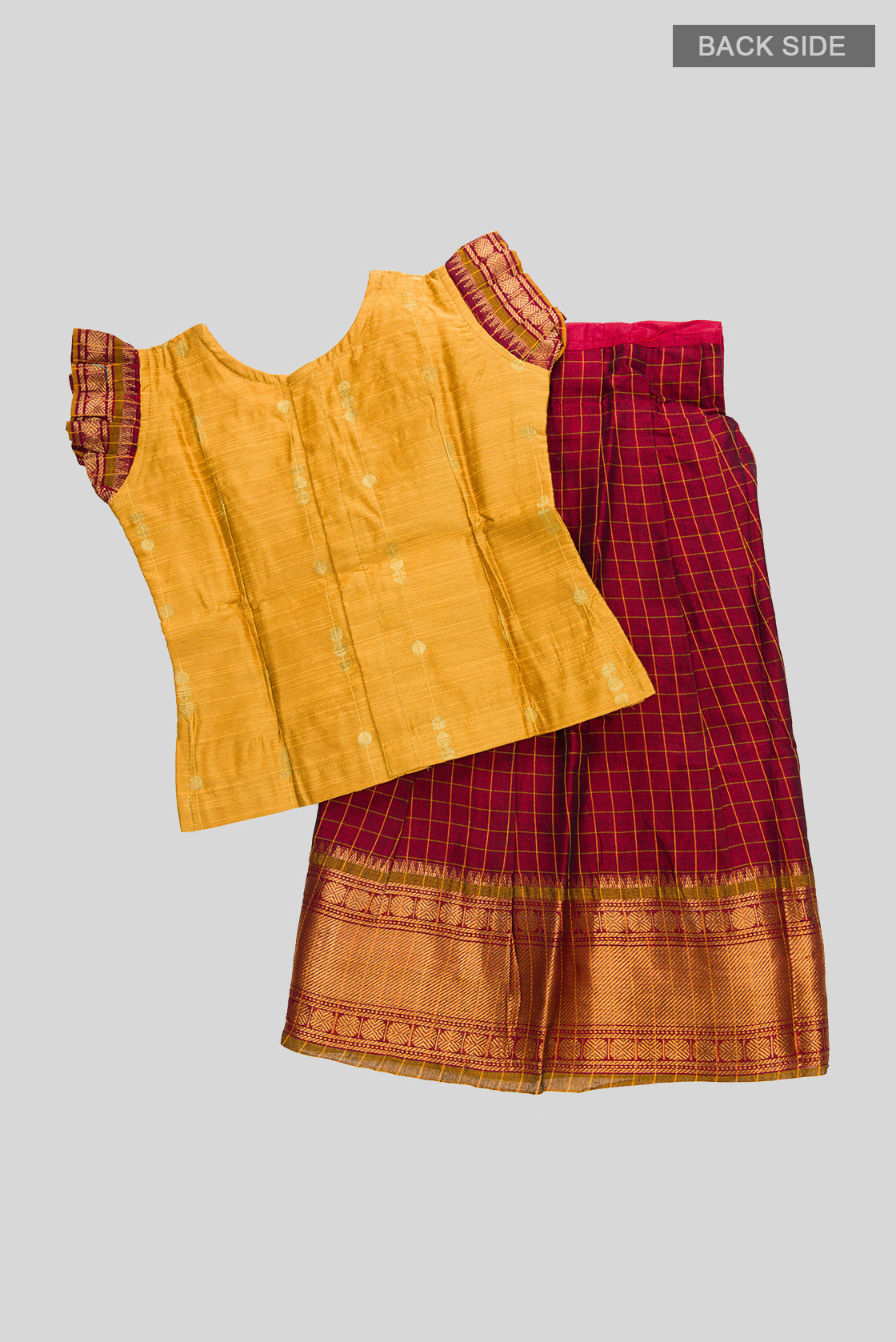 Flat lay back image of Mustard Readymade Cotton Pavadai Set with Zari Butta on the body and Zari Border