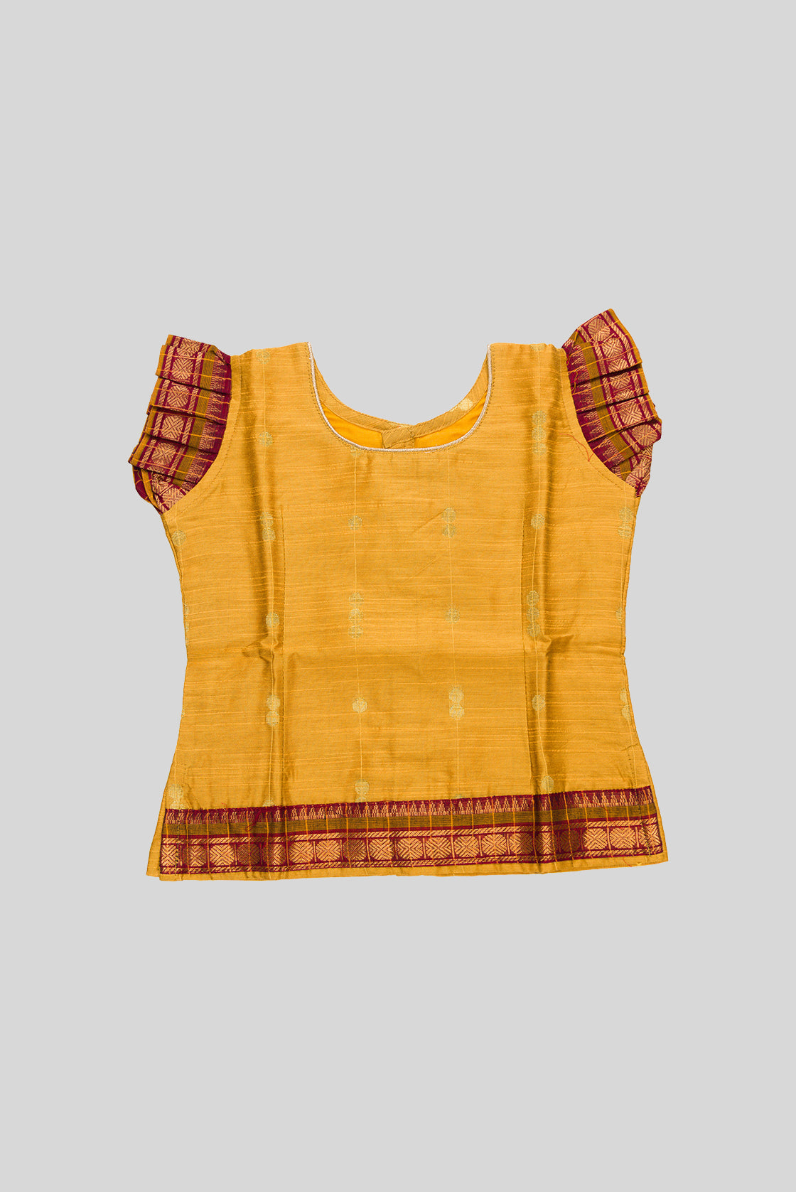 Close up blouse image of Mustard Readymade Cotton Pavadai Set with Zari Butta on the body and Zari Border
