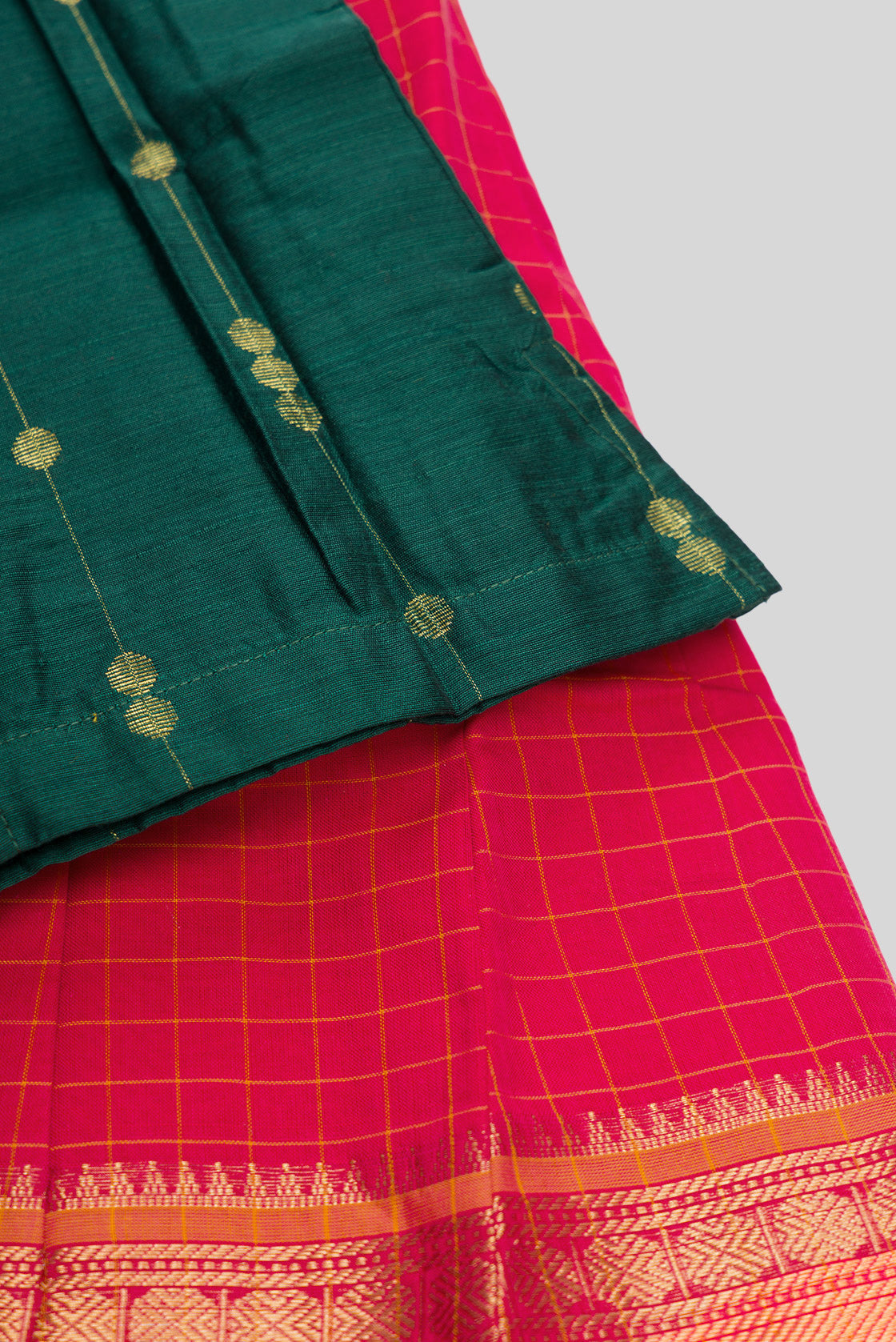 Detailed shot of Green Readymade Cotton Pavadai Set with Zari Butta on the body and Zari Border