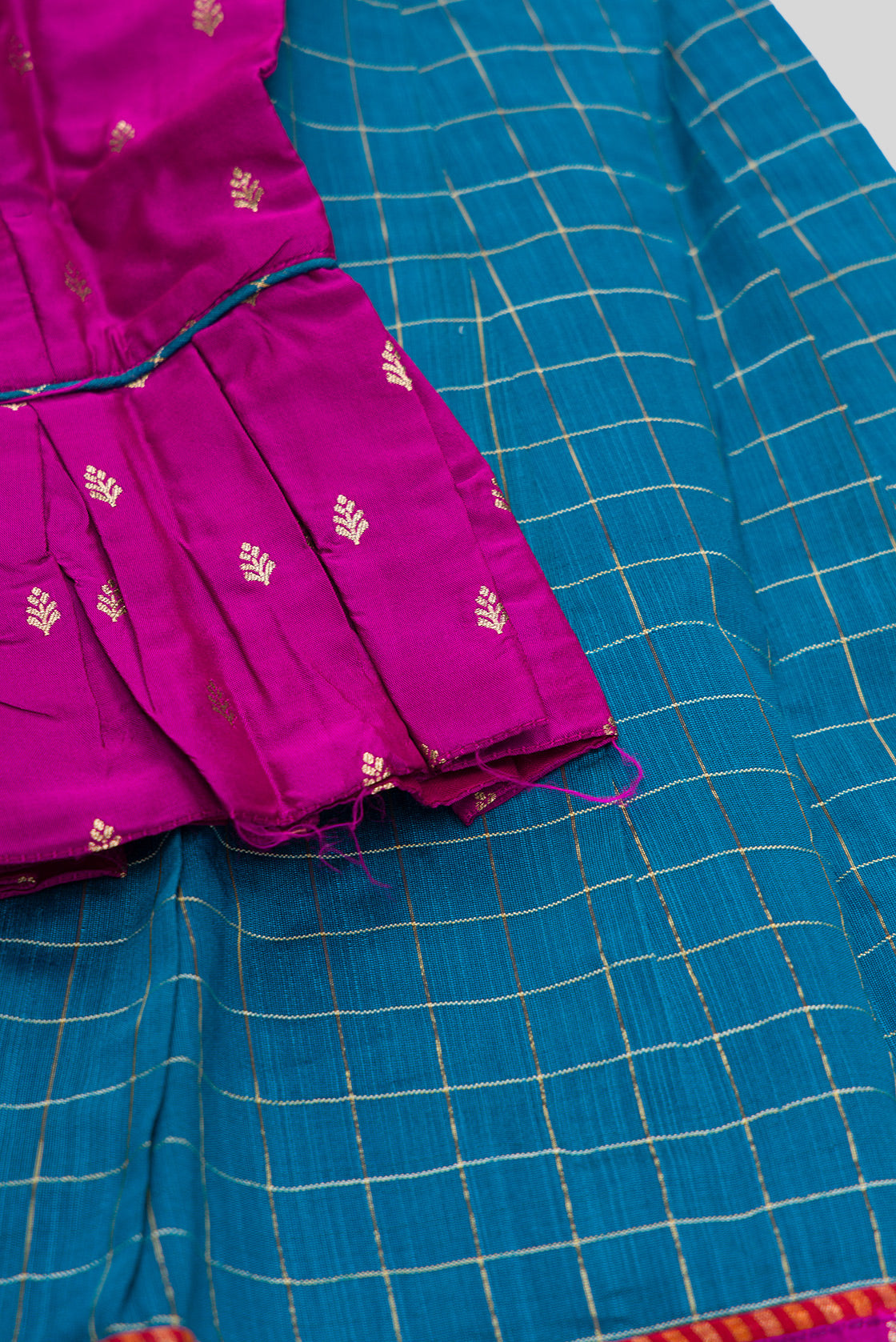 Detailed shot of Purple Readymade Cotton Pavadai Set with Zari Butta on the body and Zari Border