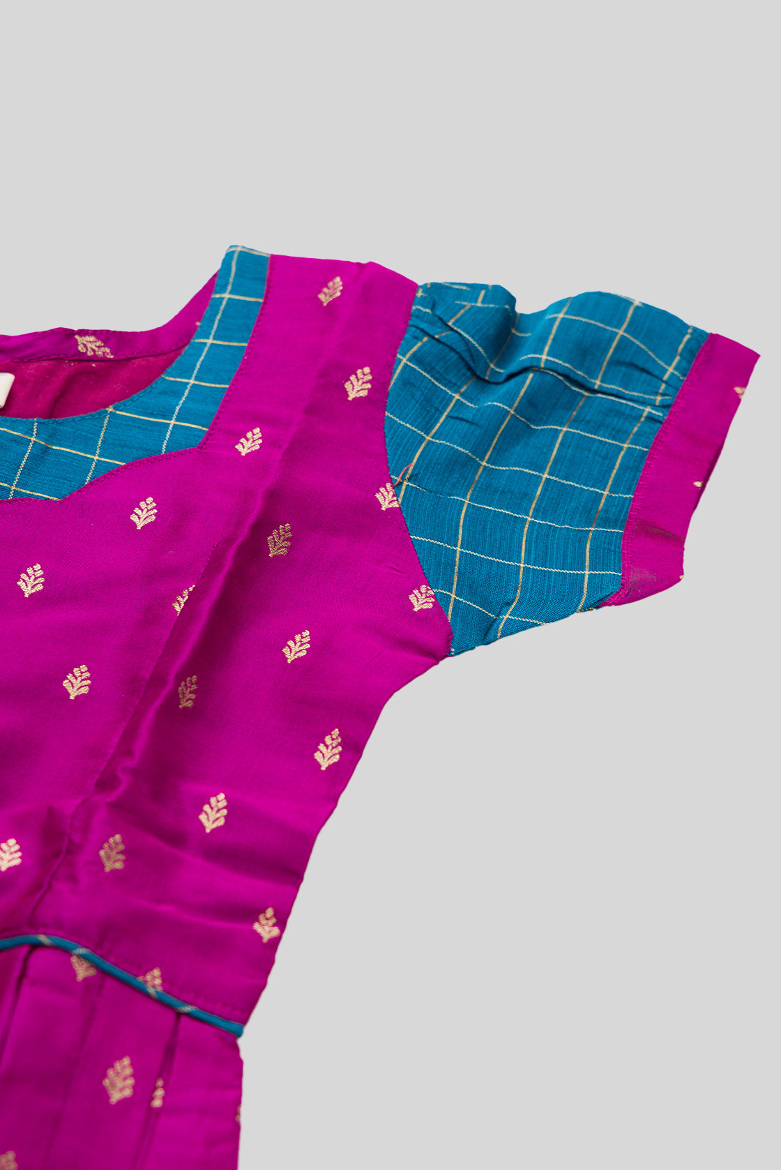 Close up sleeve details of Purple Readymade Cotton Pavadai Set with Zari Butta on the body and Zari Border