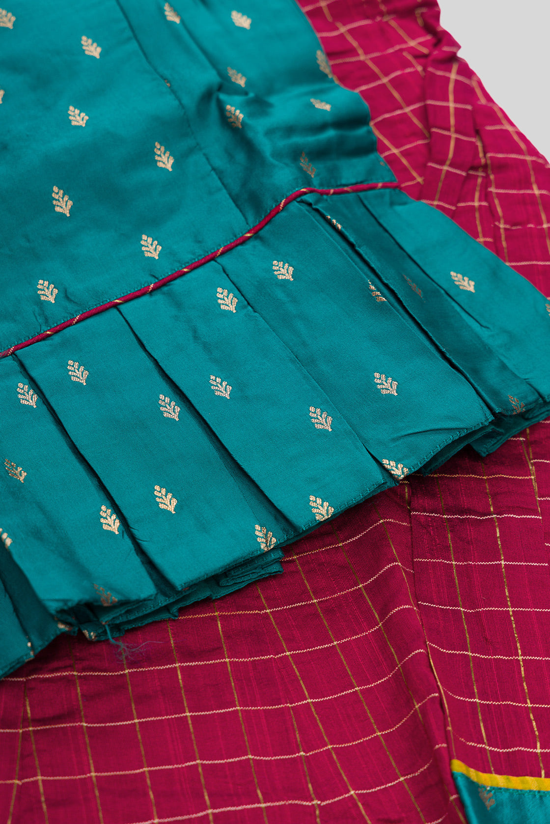 Detailed shot of Maya Blue Readymade Cotton Pavadai Set with Zari Butta on the body and Zari Border