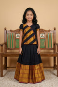 Black Readymade Cotton Pavadai Set with Zari Butta on the body and Zari Border displayed on a mannequin