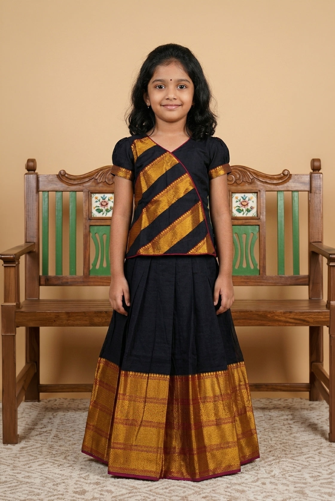 Black Readymade Cotton Pavadai Set with Zari Butta on the body and Zari Border displayed on a mannequin