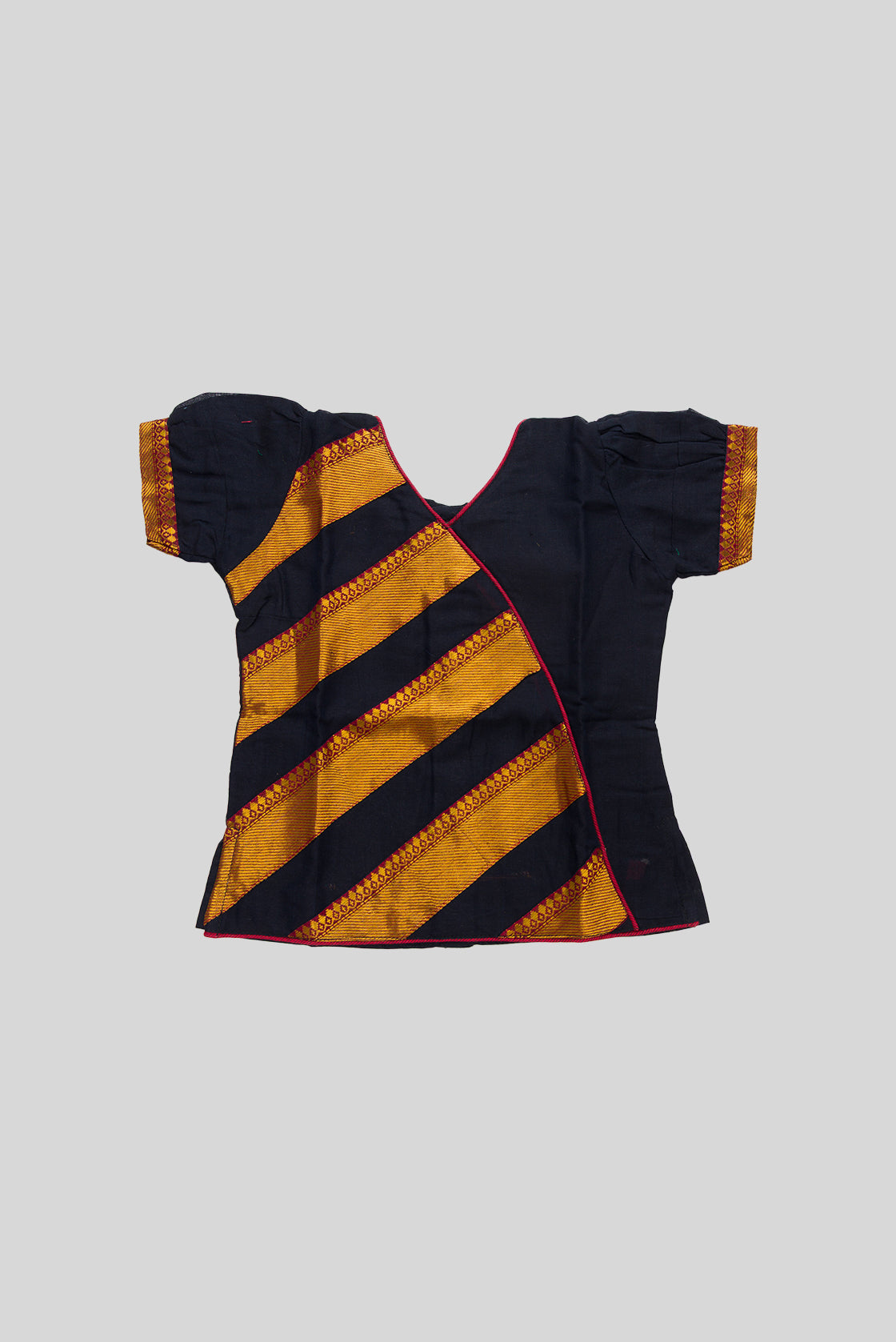 Close up blouse image of Black Readymade Cotton Pavadai Set with Zari Butta on the body and Zari Border
