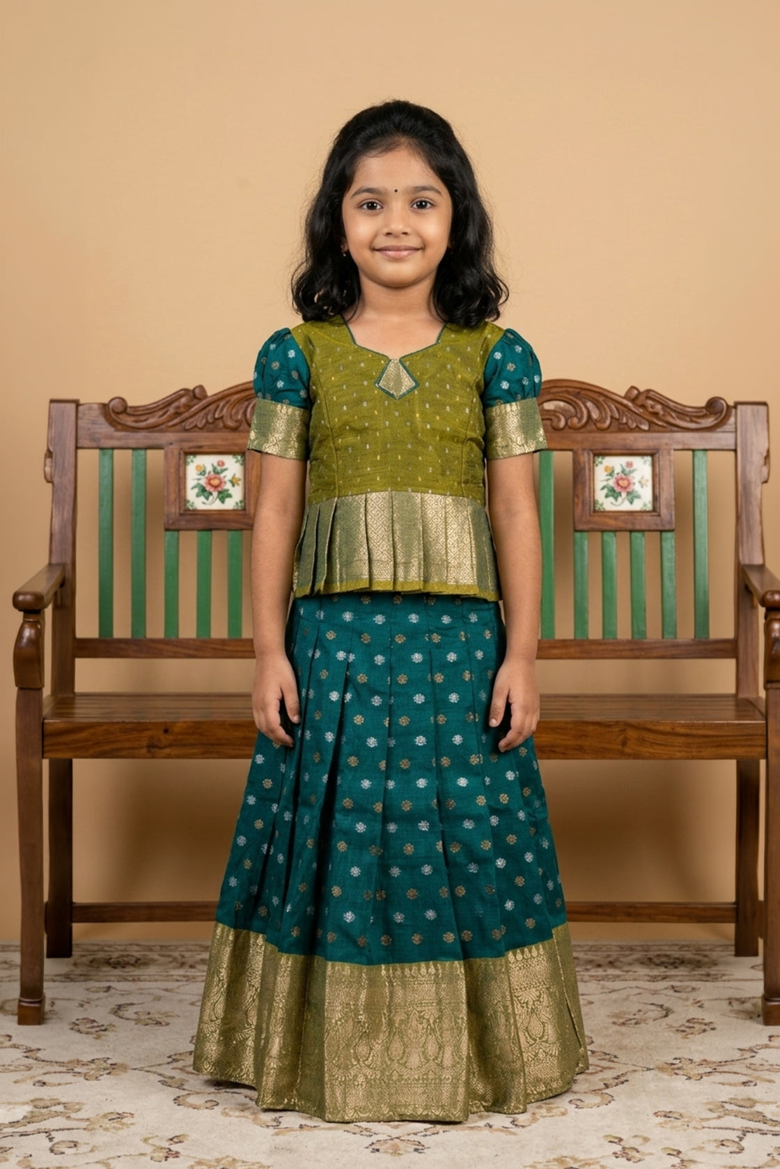Mehandi Green Readymade Cotton Pavadai Set with Zari Butta on the body and Zari Border displayed on a mannequin