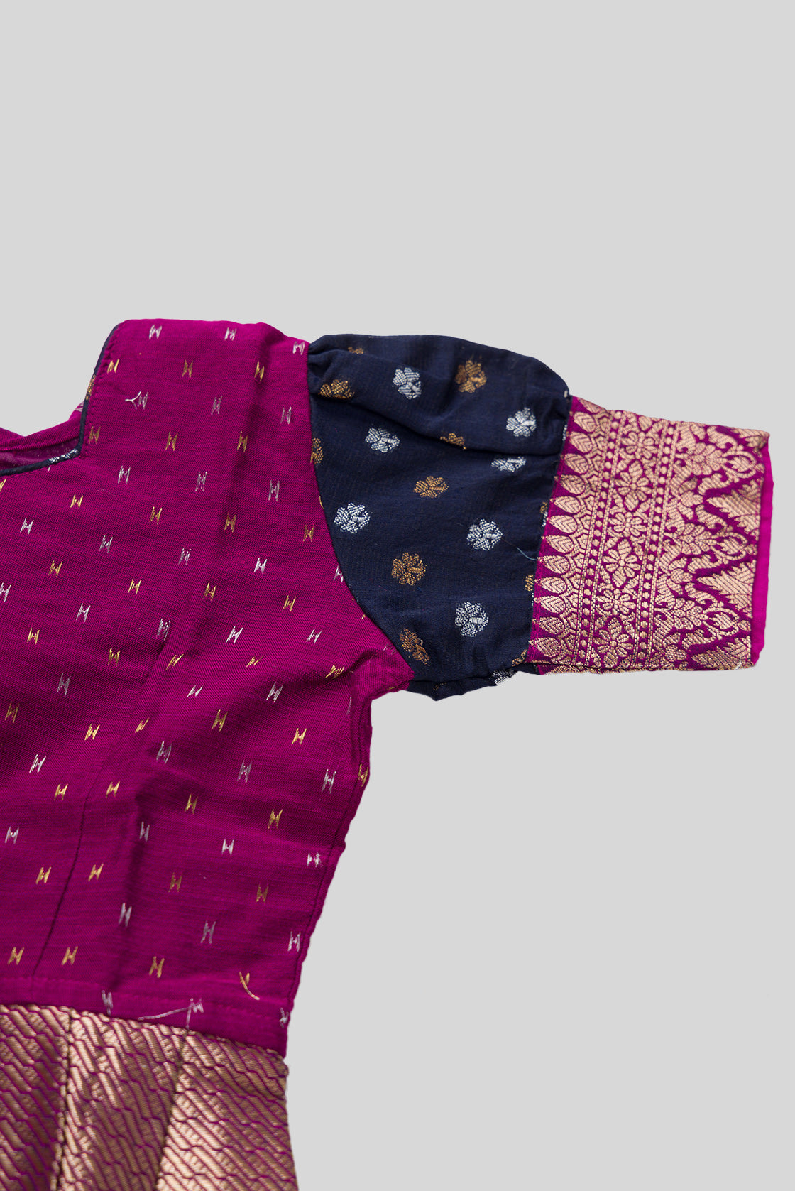 Close up sleeve details of Purple Readymade Cotton Pavadai Set with Zari Butta on the body and Zari Border