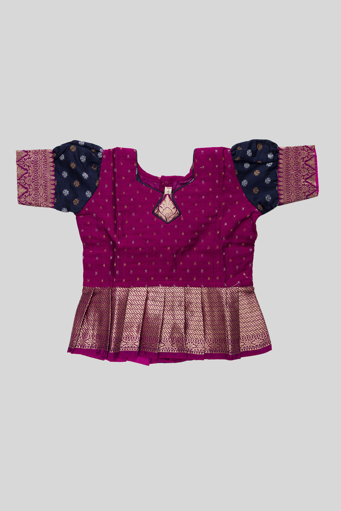 Close up blouse image of Purple Readymade Cotton Pavadai Set with Zari Butta on the body and Zari Border
