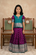 Green Readymade Cotton Pavadai Set with Zari Butta on the body and Zari Border displayed on a mannequin