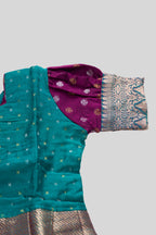 Close up sleeve details of Green Readymade Cotton Pavadai Set with Zari Butta on the body and Zari Border