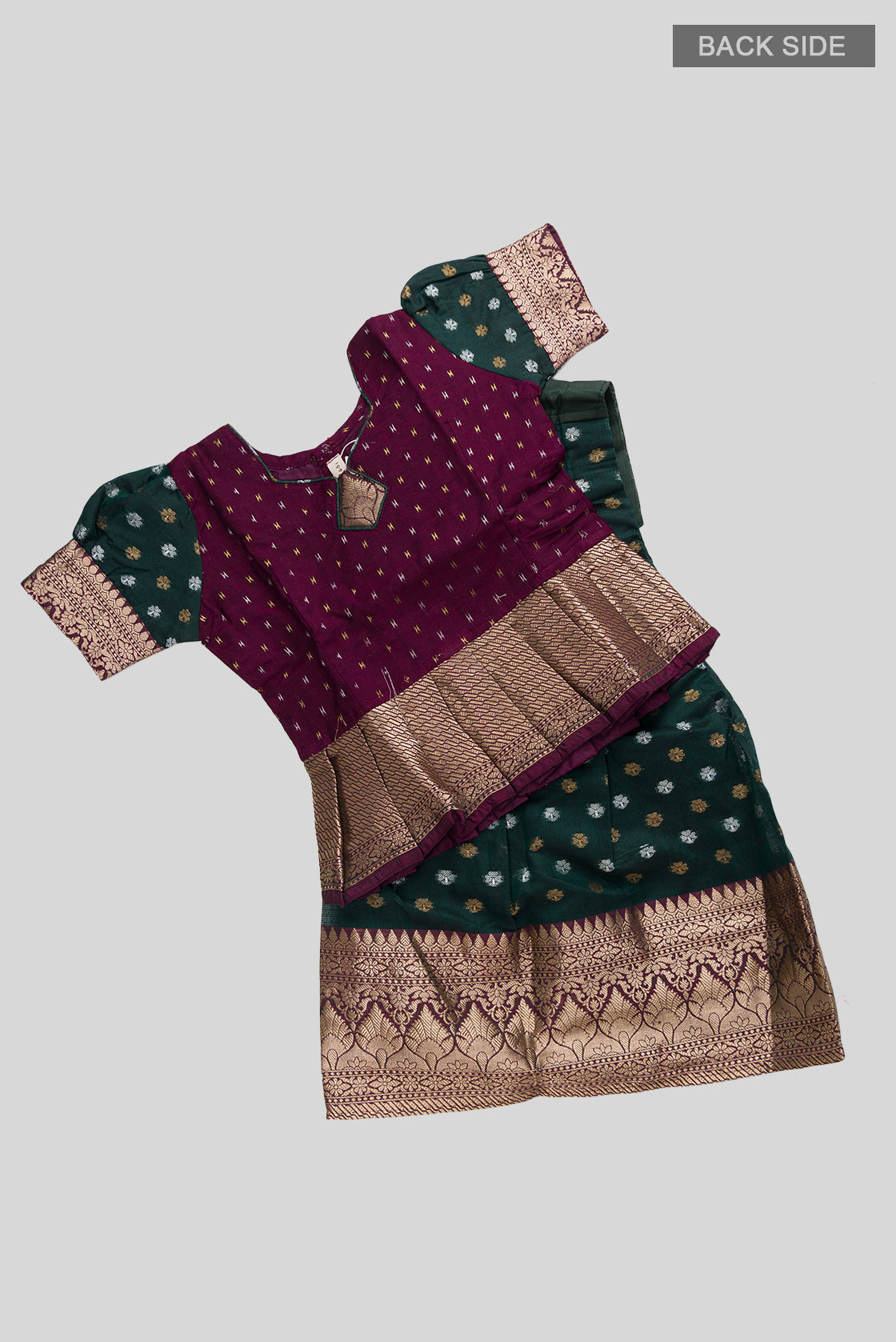 Flat lay back image of Magenta Readymade Cotton Pavadai Set with Zari Butta on the body and Zari Border