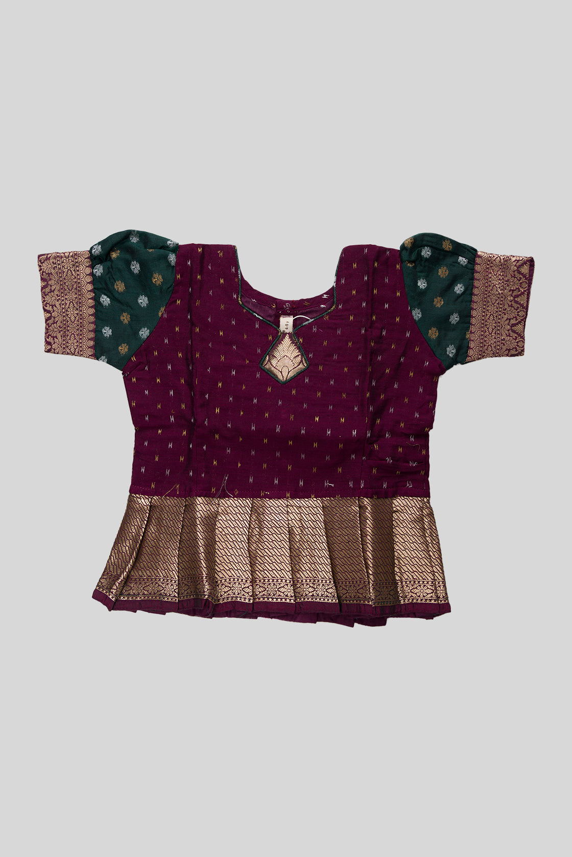 Close up blouse image of Magenta Readymade Cotton Pavadai Set with Zari Butta on the body and Zari Border