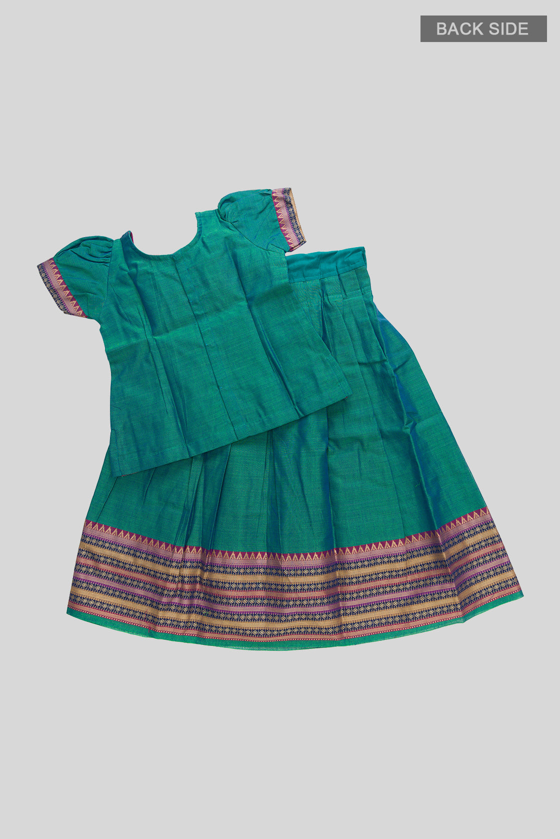 Flat lay back image of Peacock Blue Readymade Cotton Pavadai Set with  on the body and Zari Border