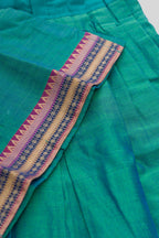Detailed shot of Peacock Blue Readymade Cotton Pavadai Set with  on the body and Zari Border