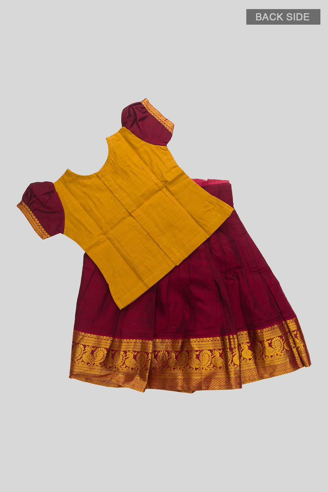 Flat lay back image of Maroon Readymade Cotton Pavadai Set with  on the body and Zari Border