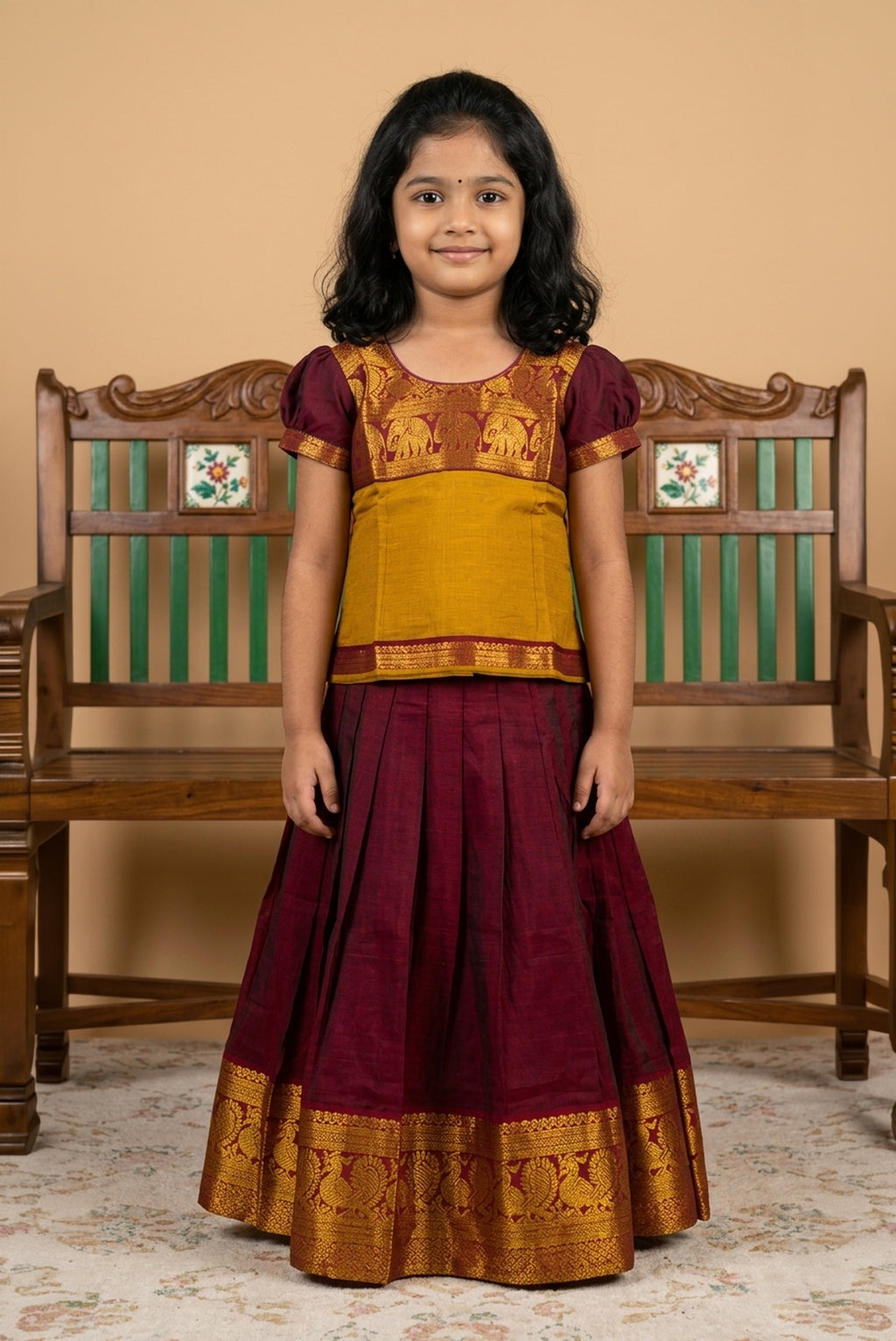 Maroon Readymade Cotton Pavadai Set with  on the body and Zari Border displayed on a mannequin