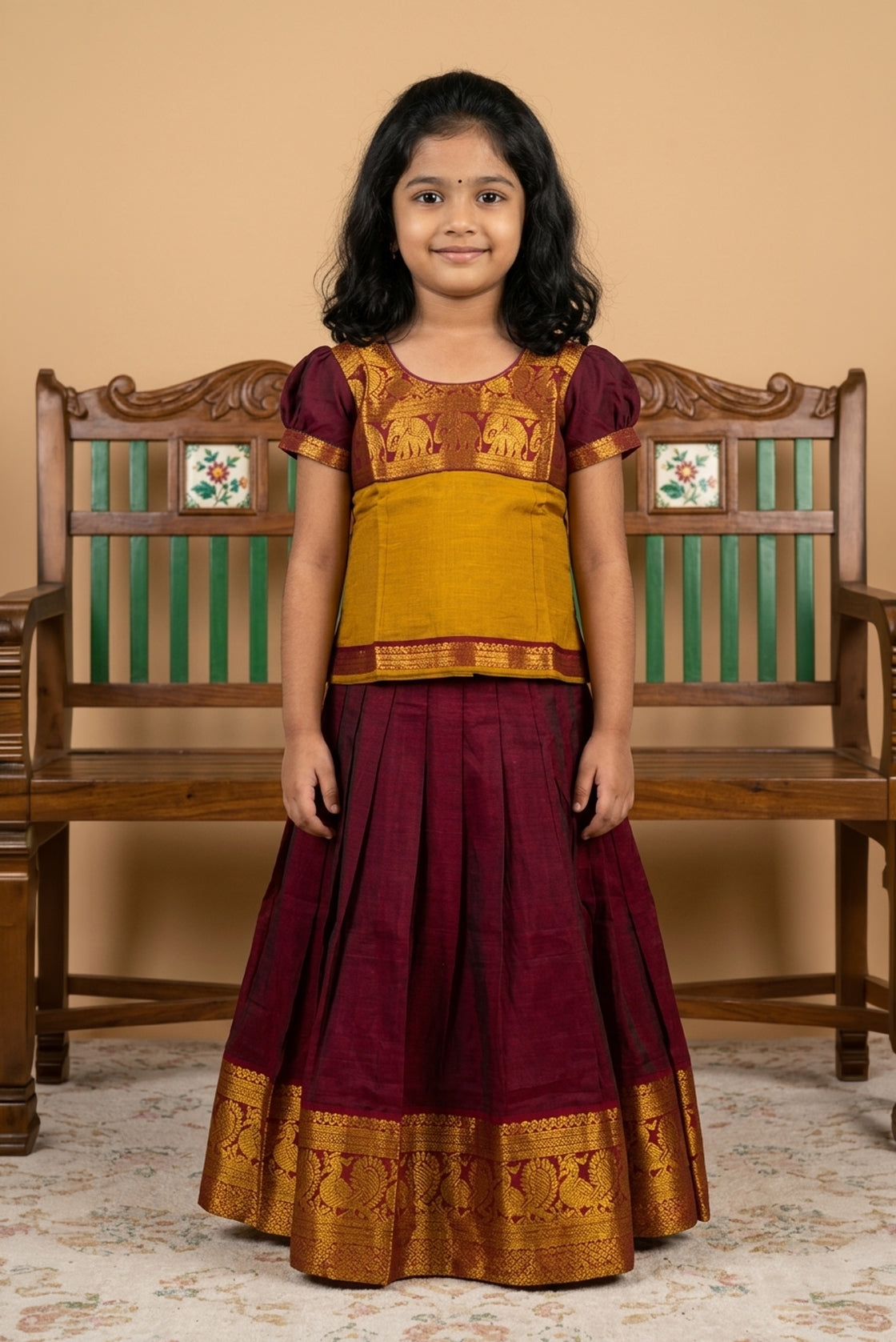 Maroon Readymade Cotton Pavadai Set with  on the body and Zari Border displayed on a mannequin