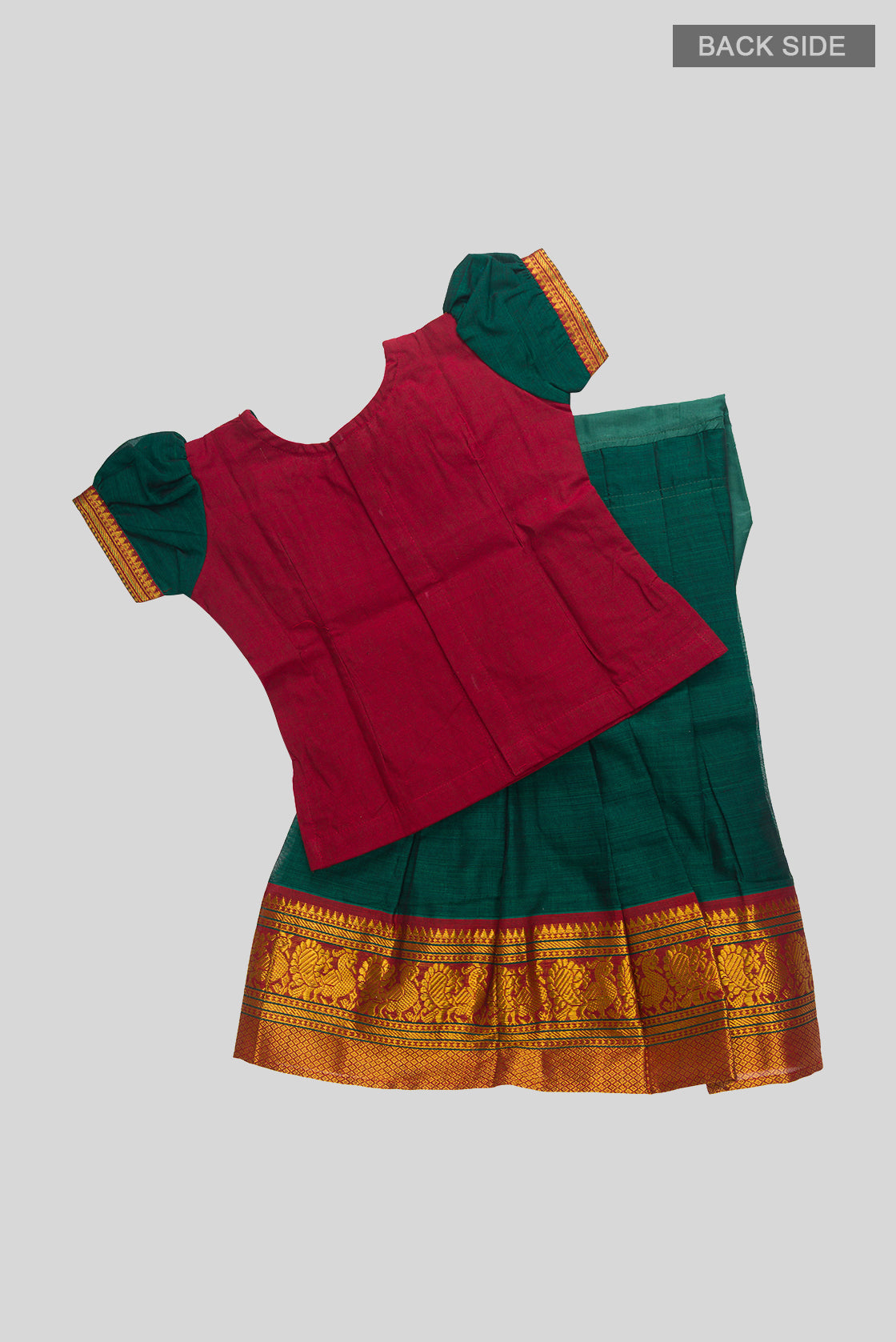Flat lay back image of Green Readymade Cotton Pavadai Set with  on the body and Zari Border