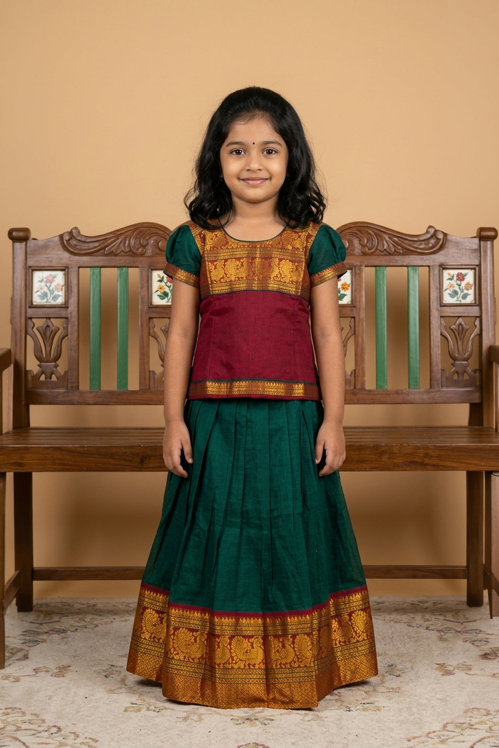 Green Readymade Cotton Pavadai Set with  on the body and Zari Border displayed on a mannequin