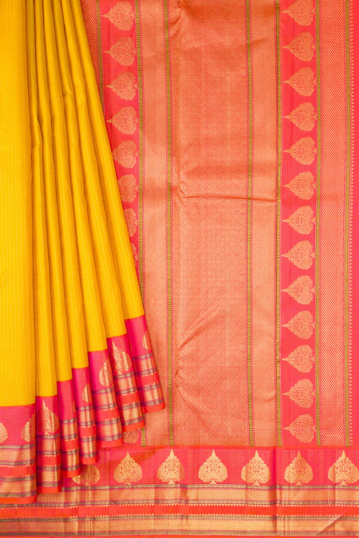 Pleats and pallu of Mustard Dual Tone Kanchipuram Silk Saree with Stripes on the body and Zari Border. 