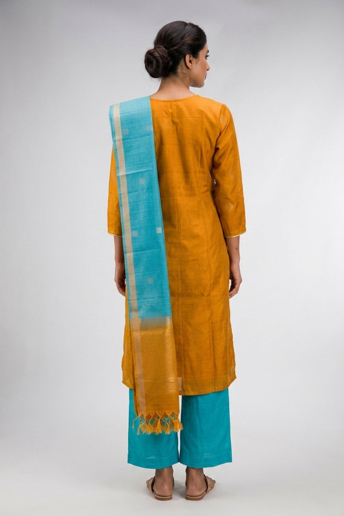 Mustard Pure Silk Womens Kurta set featuring Zari Butta Kurta paired with Light Blue Plain Body bottom and a Zari Butta dupatta in Light Blue back image displayed on an AI model