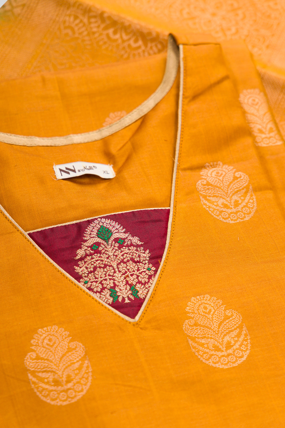 Detailed shot of Mustard Pure Silk Womens Kurta set featuring Zari Butta Kurta paired with Light Blue Plain Body bottom and a Zari Butta dupatta in Light Blue